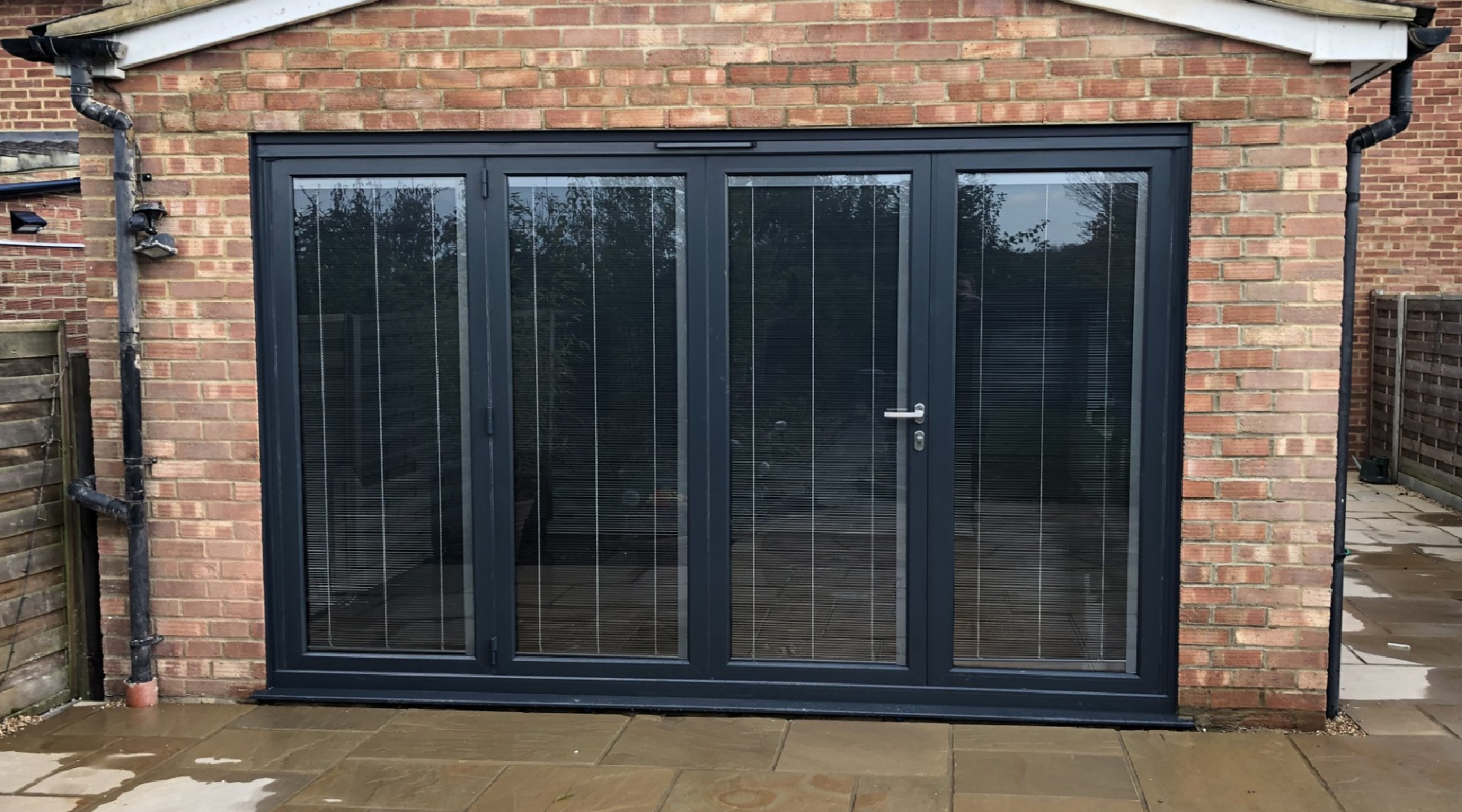 Modern Homes building with energy-efficient Bi-folding doors in Biggleswade featuring high-performance.