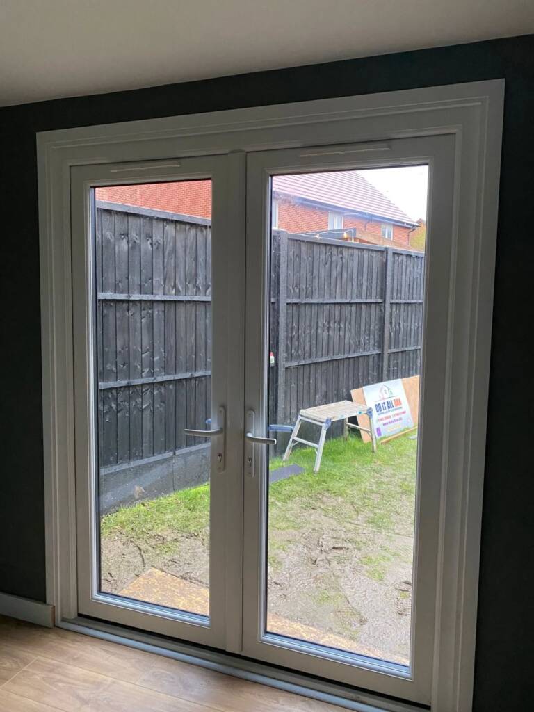 Energy-efficient French doors installed in a Bedfordshire garden room.