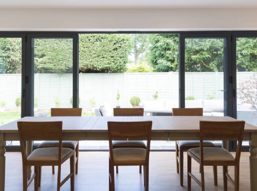 Bi-fold window repair service with new uPVC frame replacement and fitting