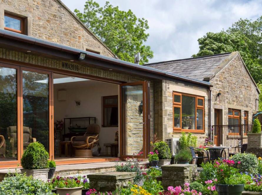 Bifold doors Hertford installed in modern rear extension with garden view
