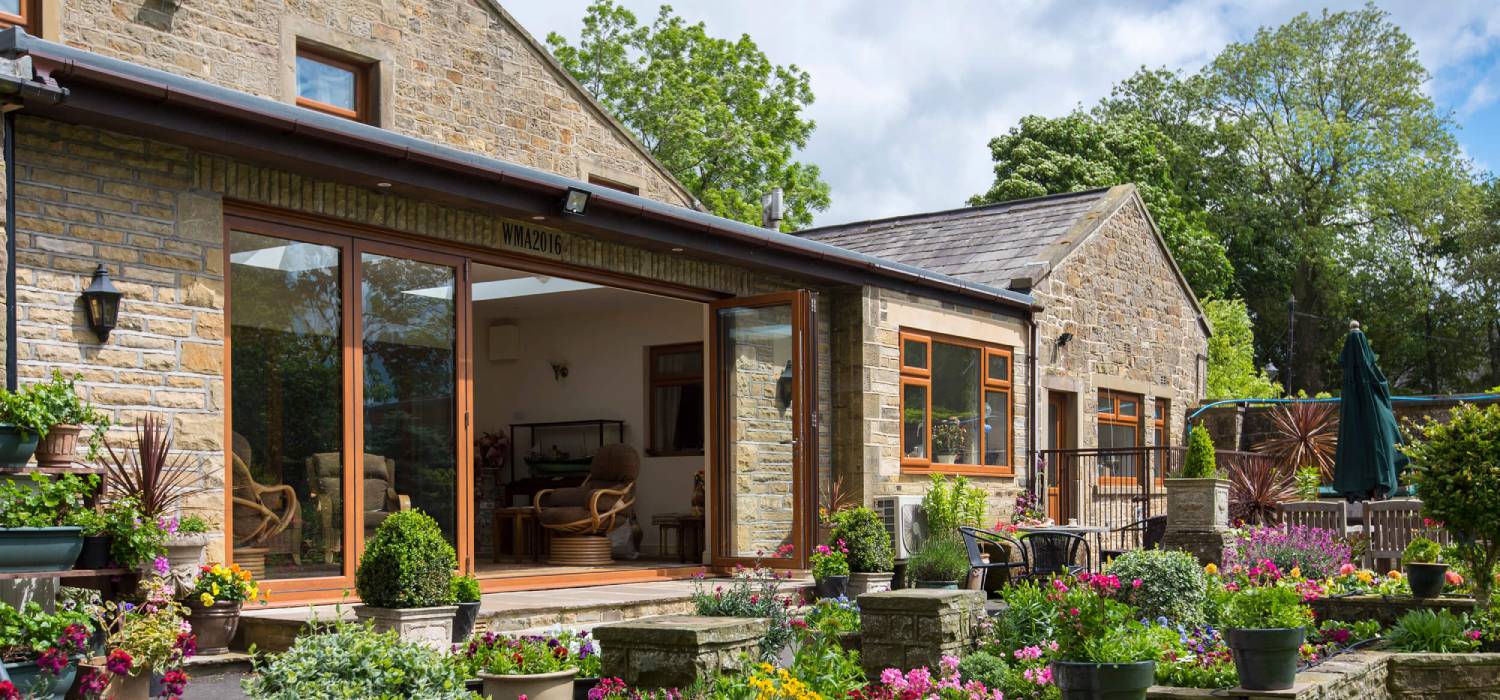 Bifold doors Hertford installed in modern rear extension with garden view
