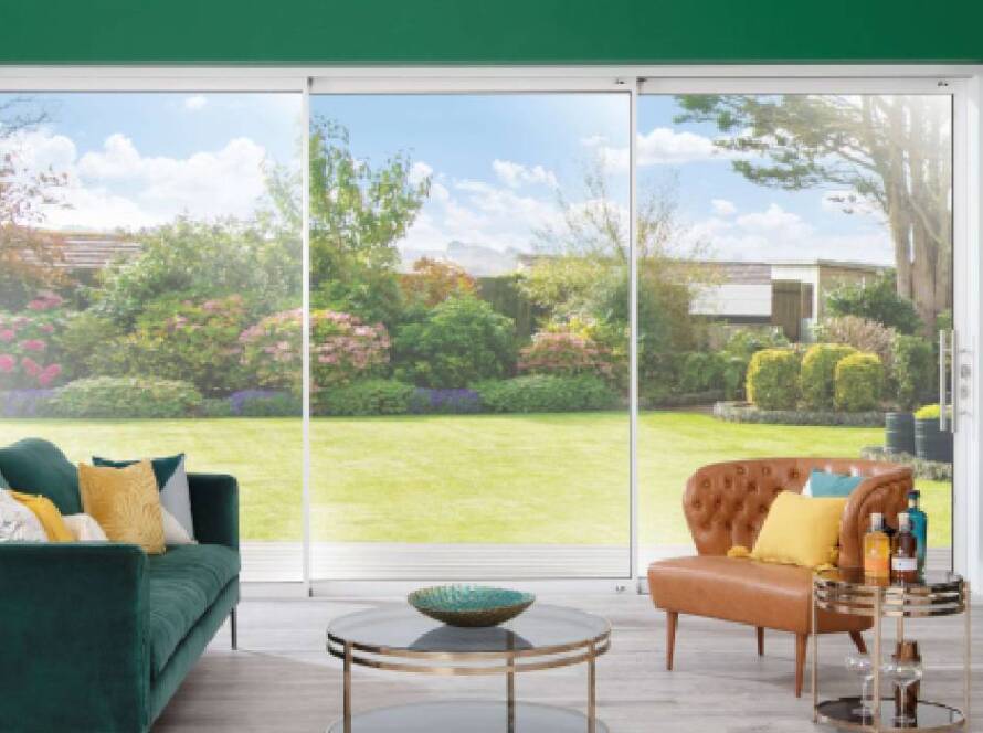 Sliding patio doors installed in modern UK garden extension