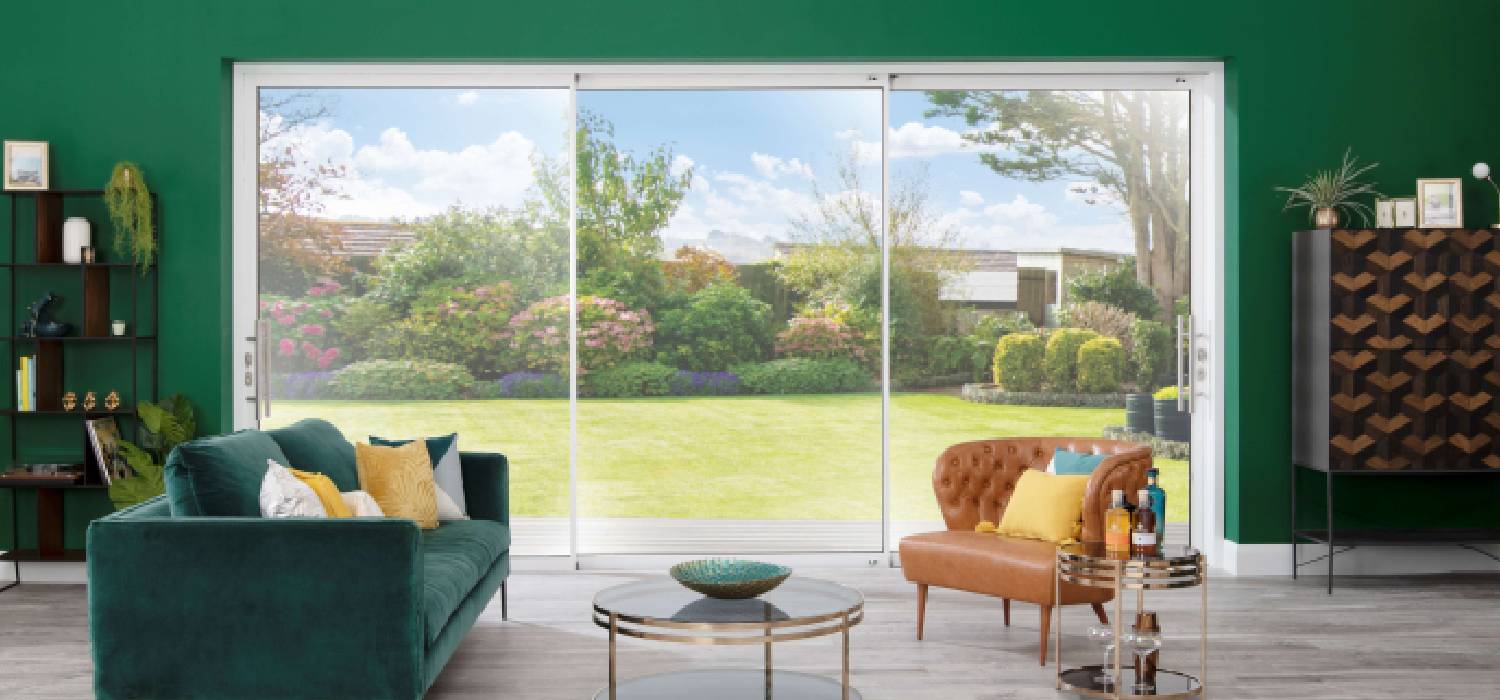 Sliding patio doors installed in modern UK garden extension