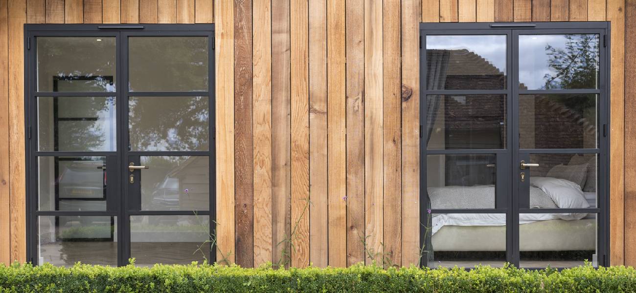 Energy-efficient windows reducing heating bills in a modern UK home with insulated uPVC windows and doors installation